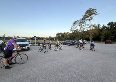 Cycling In Houston - NWCC Recent Activities Gallery 235 Cycling group at Northwest Cycling Club gathering in a parking lot for a ride.
