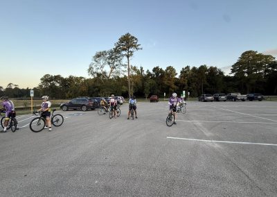 Cycling In Houston - NWCC Recent Activities Gallery 234 Cycling group from Northwest Cycling Club gathering in parking lot for a ride.