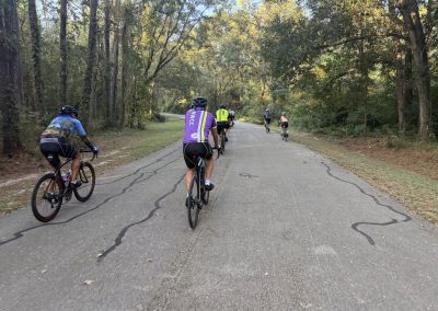 Cycling In Houston - NWCC Recent Activities Gallery 218 Cycling group on trail in wooded area, Northwest Cycling Club, scenic bike ride, outdoor fitness, cycling enthusiasts, Oregon trail.