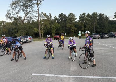 Cycling In Houston - NWCC Recent Activities Gallery 227 Bicycle group ride at Northwest Cycling Club event in a parking lot.