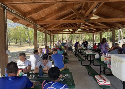 Cycling In Houston - NWCC Recent Activities Gallery 141 Enjoying a picnic at Northwest Cycling Club's outdoor pavilion with fellow cyclists after a group ride.