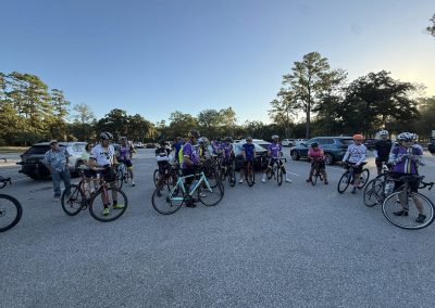 Cycling In Houston - NWCC Recent Activities Gallery 180 Cycling group at Northwest Cycling Club event in a parking lot during early morning.