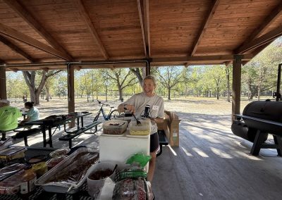 Cycling In Houston - NWCC Recent Activities Gallery 164 Freshly prepared food at Northwest Cycling Club's outdoor picnic area for cyclists.