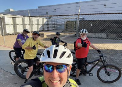 Cycling In Houston - NWCC Recent Activities Gallery 177 Happy cyclists from Northwest Cycling Club giving thumbs up during outdoor ride in sunny weather.