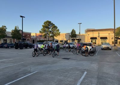 Cycling In Houston - NWCC Recent Activities Gallery 130 Cycling group gathering in a parking lot for Northwest Cycling Club bike ride event.