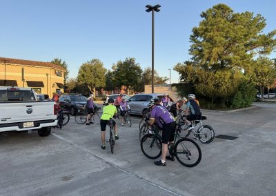 Cycling In Houston - NWCC Recent Activities Gallery 131 Group of NWCC cyclists gathering in a parking lot, participating in Northwest Cycling Club rides.