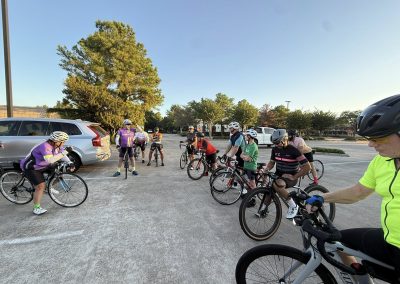 Cycling In Houston - NWCC Recent Activities Gallery 132 Group of cyclists preparing for a ride at Northwest Cycling Club, outdoor bike ride, community cycling event.