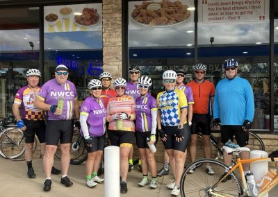 Cycling In Houston - NWCC Recent Activities Gallery 115 Outdoor cycling group members at NWCC Houston after ride boost energy with drinks.