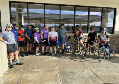 Cycling In Houston - NWCC Recent Activities Gallery 113 1. group of cyclists in cycling gear outside building.