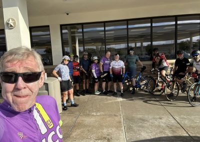 Cycling In Houston - NWCC Recent Activities Gallery 114 Vibrant group of cyclists from Northwest Cycling Club ready for a ride outside a cafe.