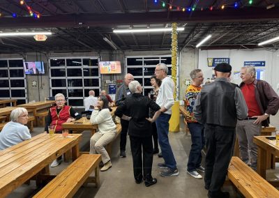 Cycling In Houston - NWCC Recent Activities Gallery 86 Indoor social gathering of Northwest Cycling Club members at a Eureka Heights brewery.