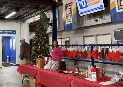 Cycling In Houston - NWCC Recent Activities Gallery 62 Decorated Christmas stockings and festive table at Northwest Cycling Club holiday event.