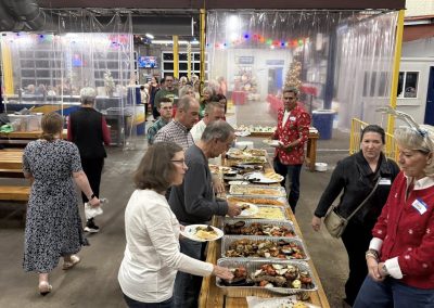Cycling In Houston - NWCC Recent Activities Gallery 88 Bottomless buffet at Northwest Cycling Club holiday event with diverse food options.