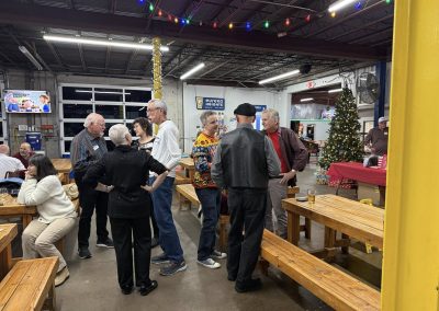 Cycling In Houston - NWCC Recent Activities Gallery 66 Festive scenic gathering at Northwest Cycling Club holiday event with Christmas decorations and socializing.