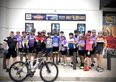Cycling In Houston - NWCC Recent Activities Gallery 37 Group of cyclists in colorful gear at Northwest Cycling Club event.