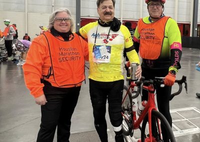 Cycling In Houston - NWCC Recent Activities Gallery 21 Vibrant cycling event at Indoor Houston Marathon with cyclists in colorful gear.